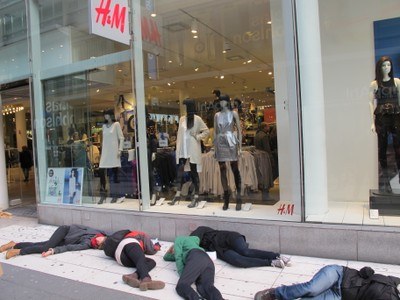 Activists faint outside H&M flagship store